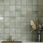 Soft green wall tiles for a low maintenance backsplash