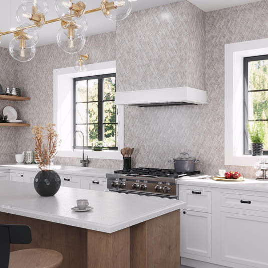 Tiled Range Hood with Wooden Beige Diamond Marble Mosaic Backsplash to Match in a White and Brass Kitchen