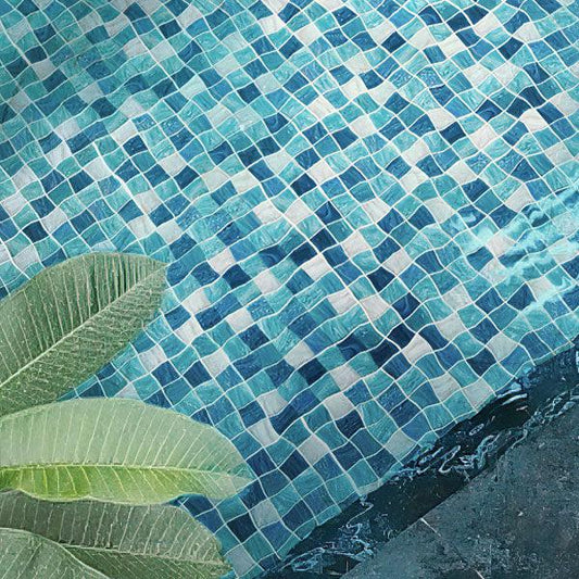 Pool Bottom Tiled with Aquamarine Blue Mixed Squares Glass TilesAquamarine Blue 2" Mixed Squares Glass Tile