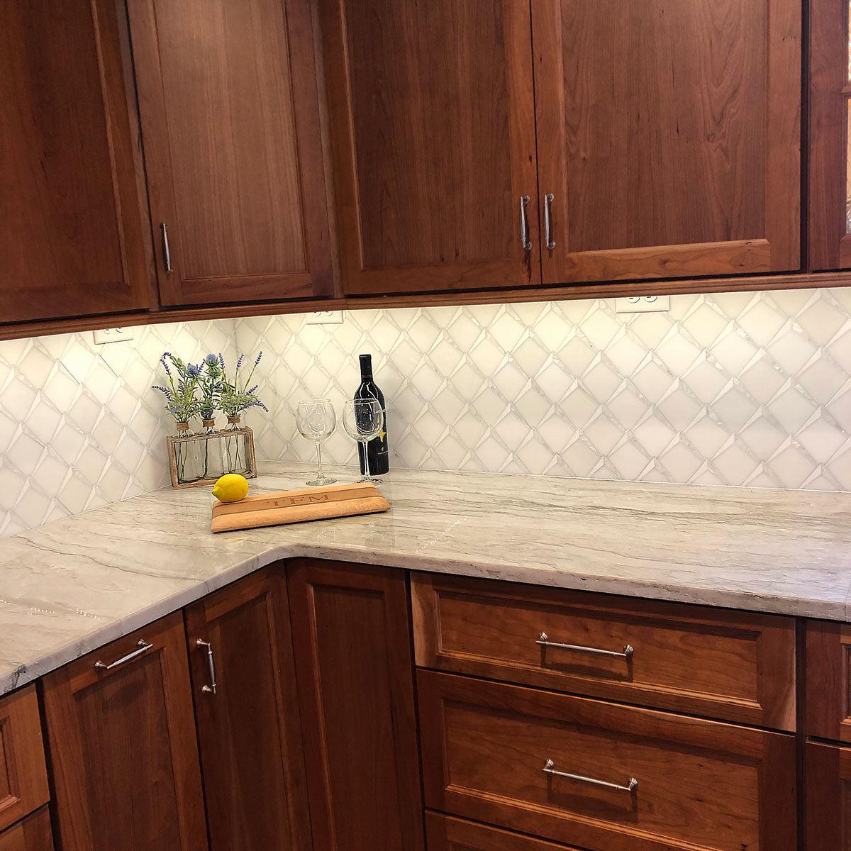 Arrowhead Pearl Marble Mosaic Kitchen Wall Tile with warm wood cabinets