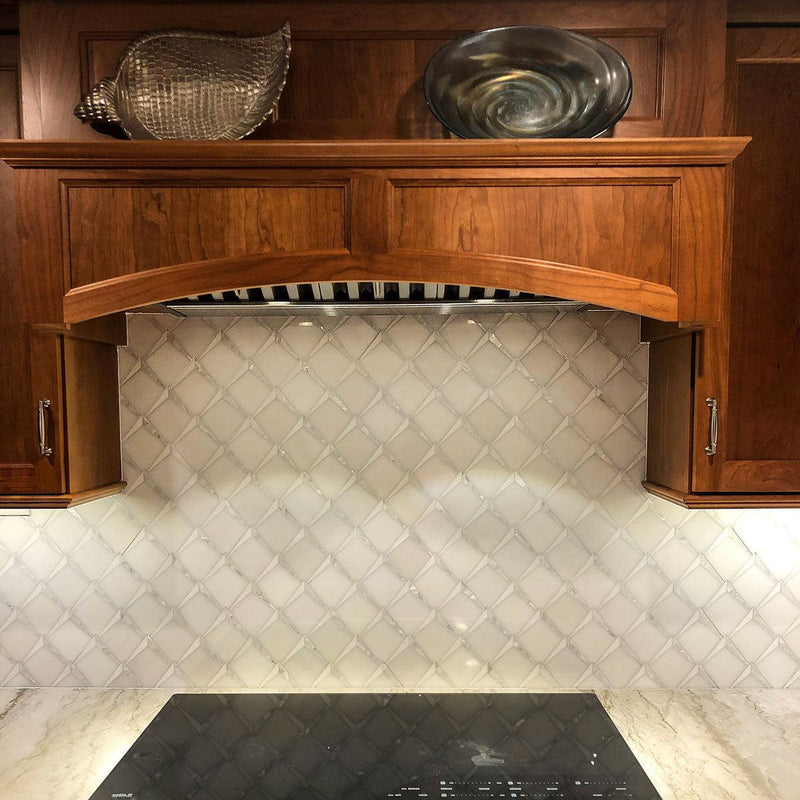 Arrowhead Pearl Marble Mosaic kitchen wall tile behind the stove