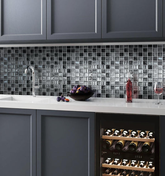 Shimmery silver glass tile kitchen sink backsplash