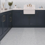 Blue and white marble floor and backsplash tile for a laundry room