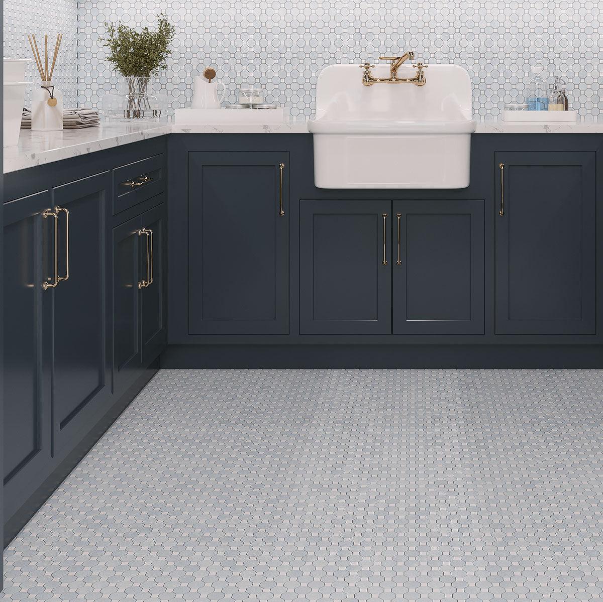 Blue and white marble floor and backsplash tile for a laundry room