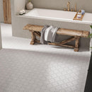 Etched white marble bathroom floor