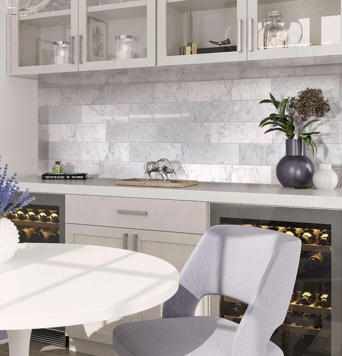 Carrara marble subway tile backsplash for a built-in pantry and wine bar
