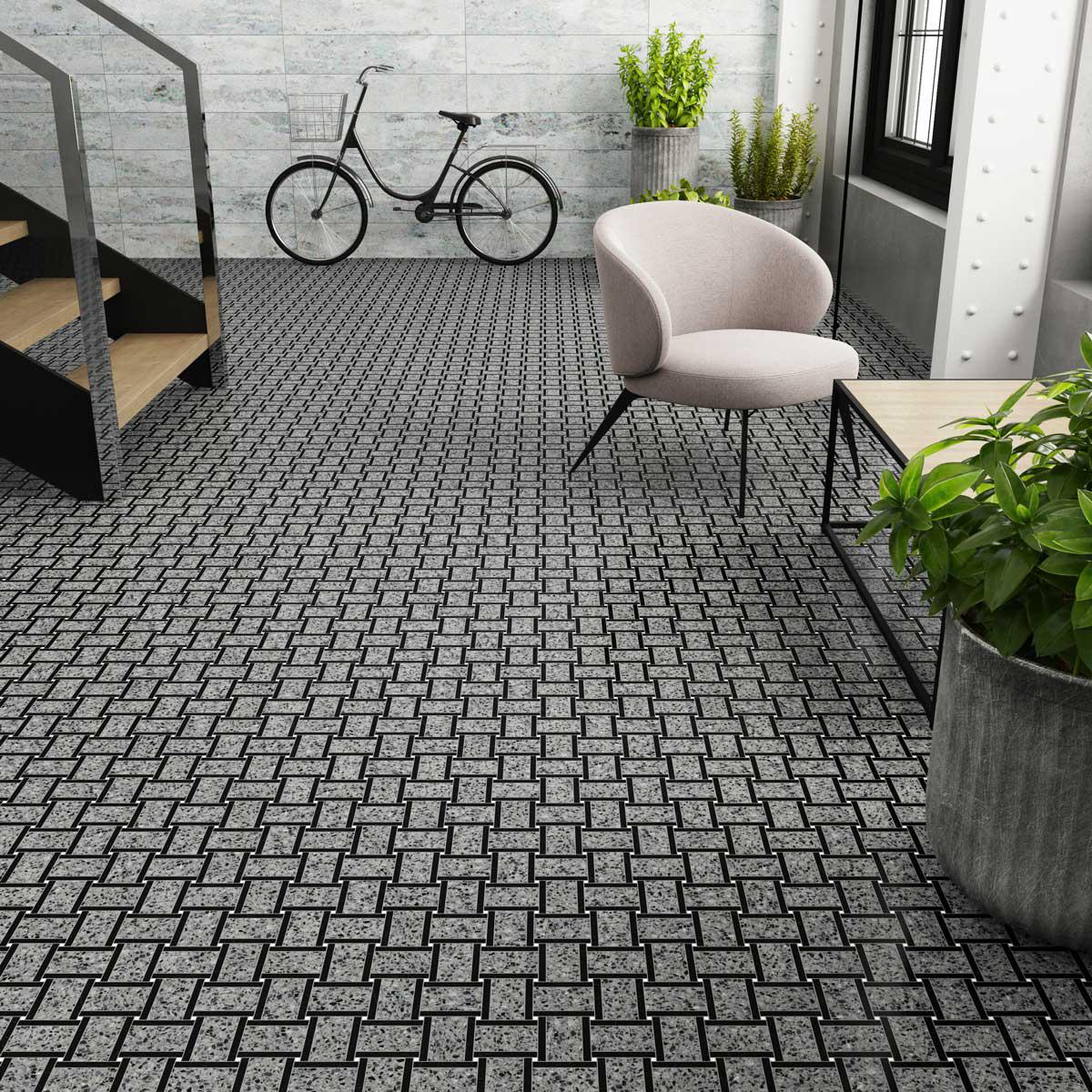 Dark and dramatic speckled terrazzo basket weave tile