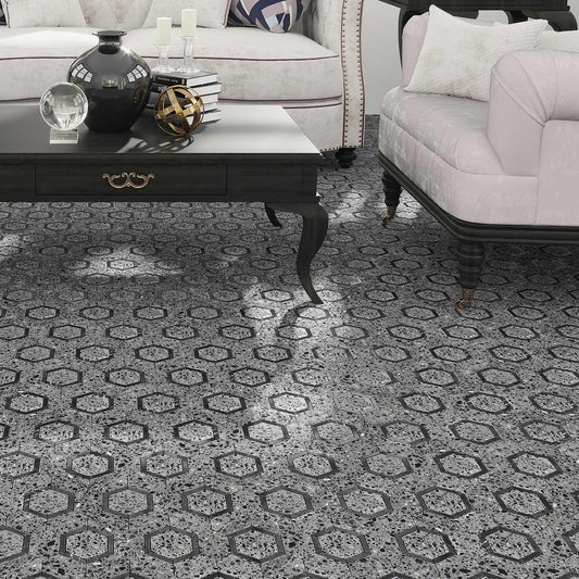 Black and gray hexagon mosaic tile with terrazzo speckles