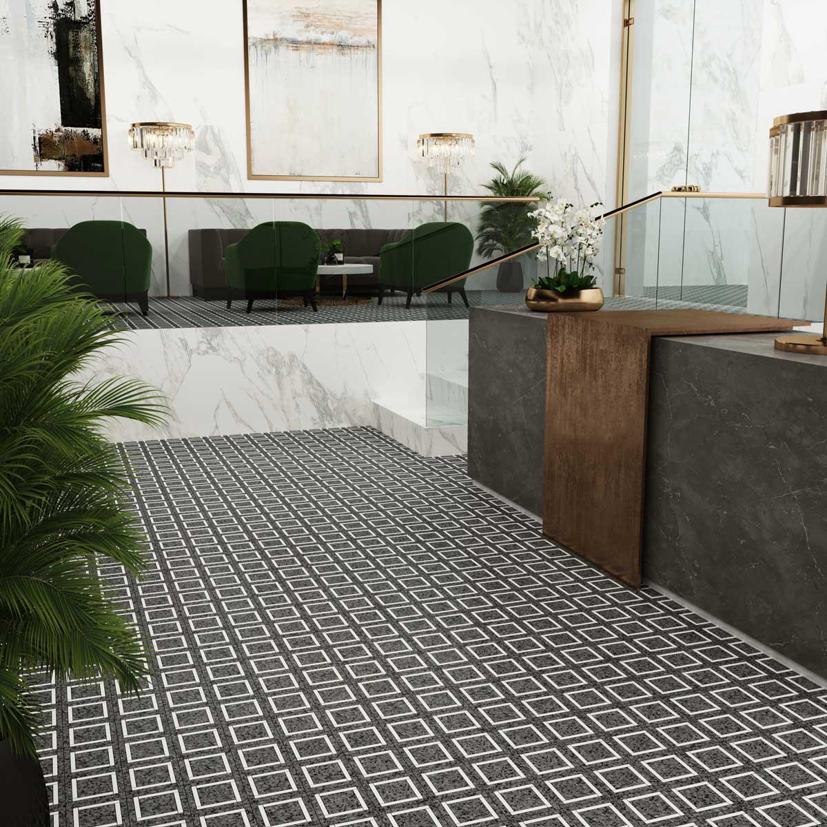 Bold patterned hotel lobby floor with square terrazzo speckled tiles