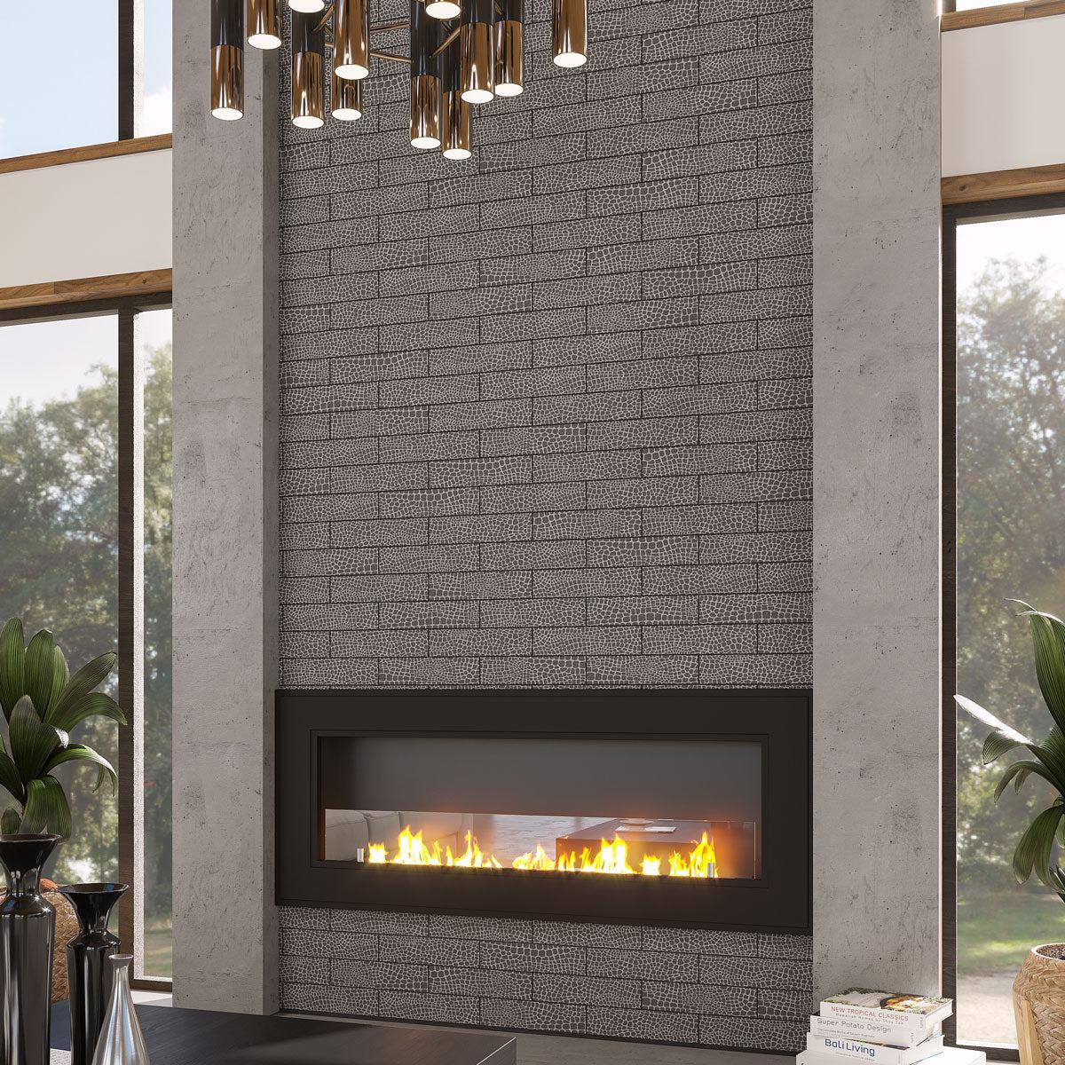 Modern living room with a fireplace accent wall with Black Gator Etched Subway Marble Tiles