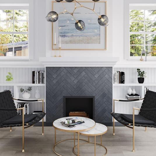 Contemporary living room design with black marble subway tile herringbone fireplace surround