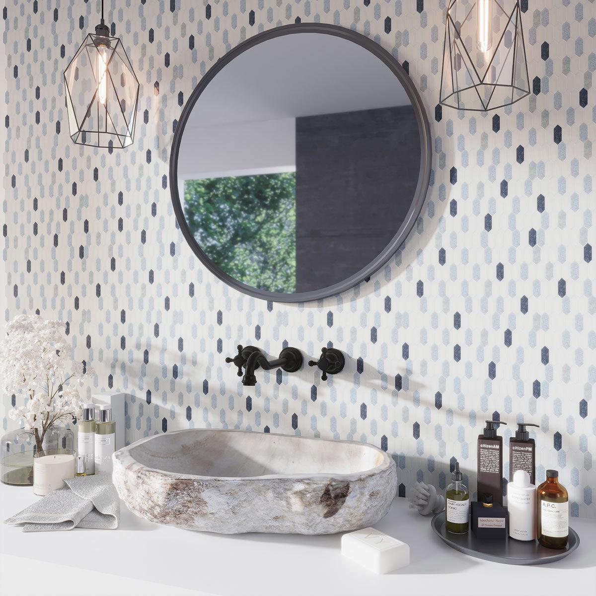 Modern boho bathroom with patterned tile in white and blue marble