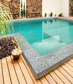 Outdoor Pool Tiled with Blue Pearl Herringbone Mosaic