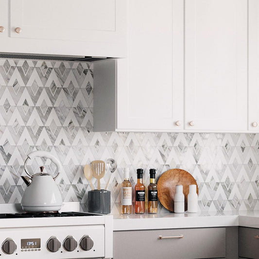 Gray and White Kitchen with Calacatta Bluette and White Marble Stellar Diamond Mosaic Backsplash Tile