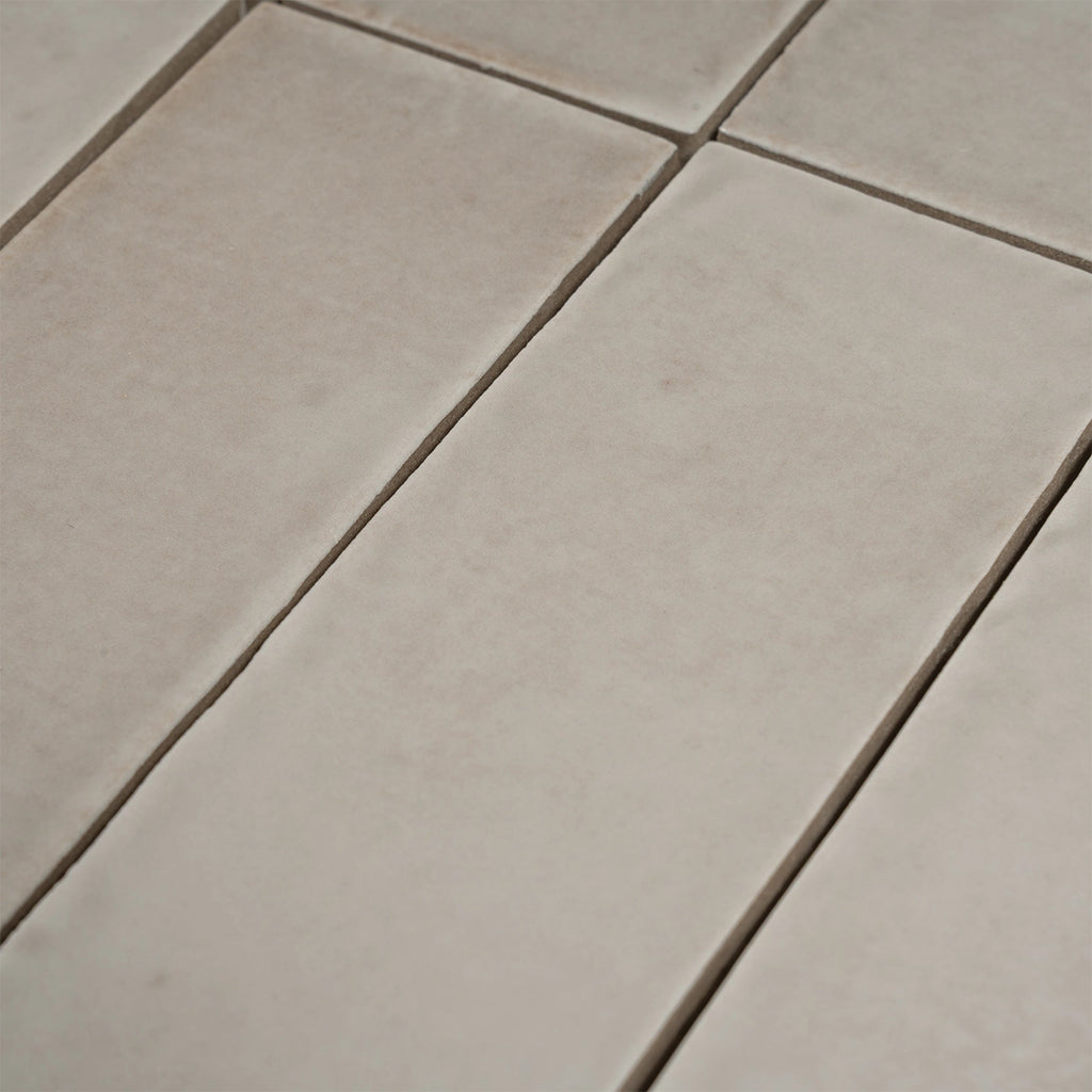 Calta Pearl Gray Gloss Porcelain Subway Tile 2x6 | Tile Club