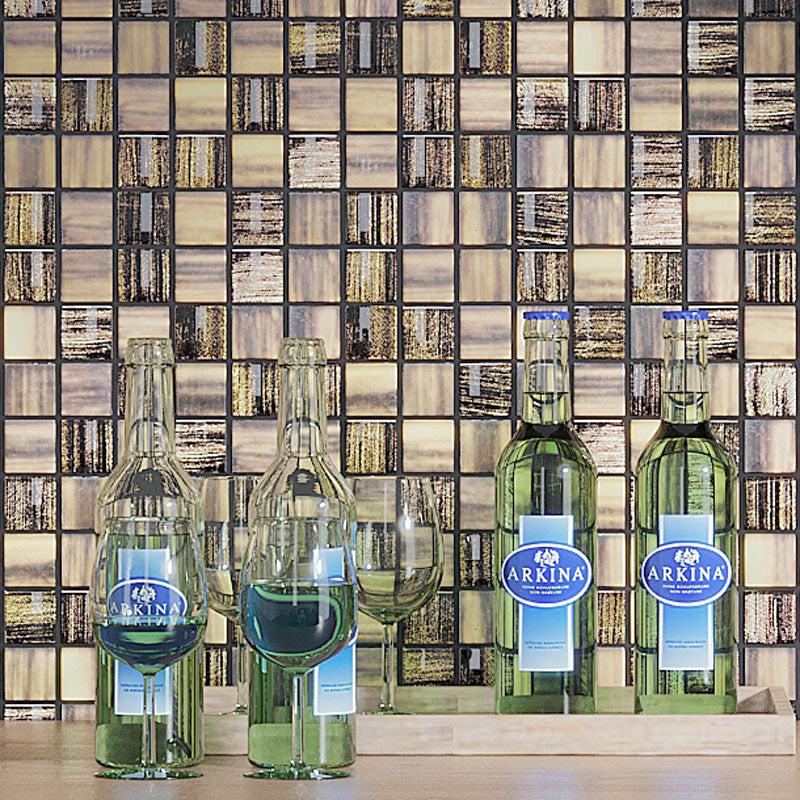 Bottles and Glasses on a Background of Charcoal Foil And Frosted Square Mosaic