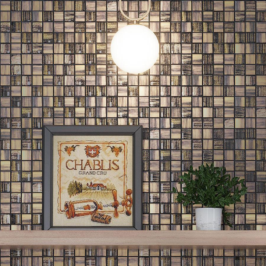 A Hanging Lamp and a Small Picture on a Shelf in the Background of Charcoal Foil And Frosted Square Mosaic Tile