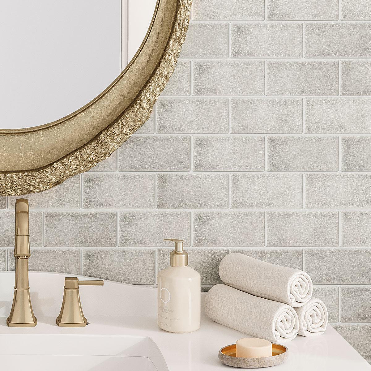 Pale green ceramic tile with a crackle texture for a vintage bathroom wall