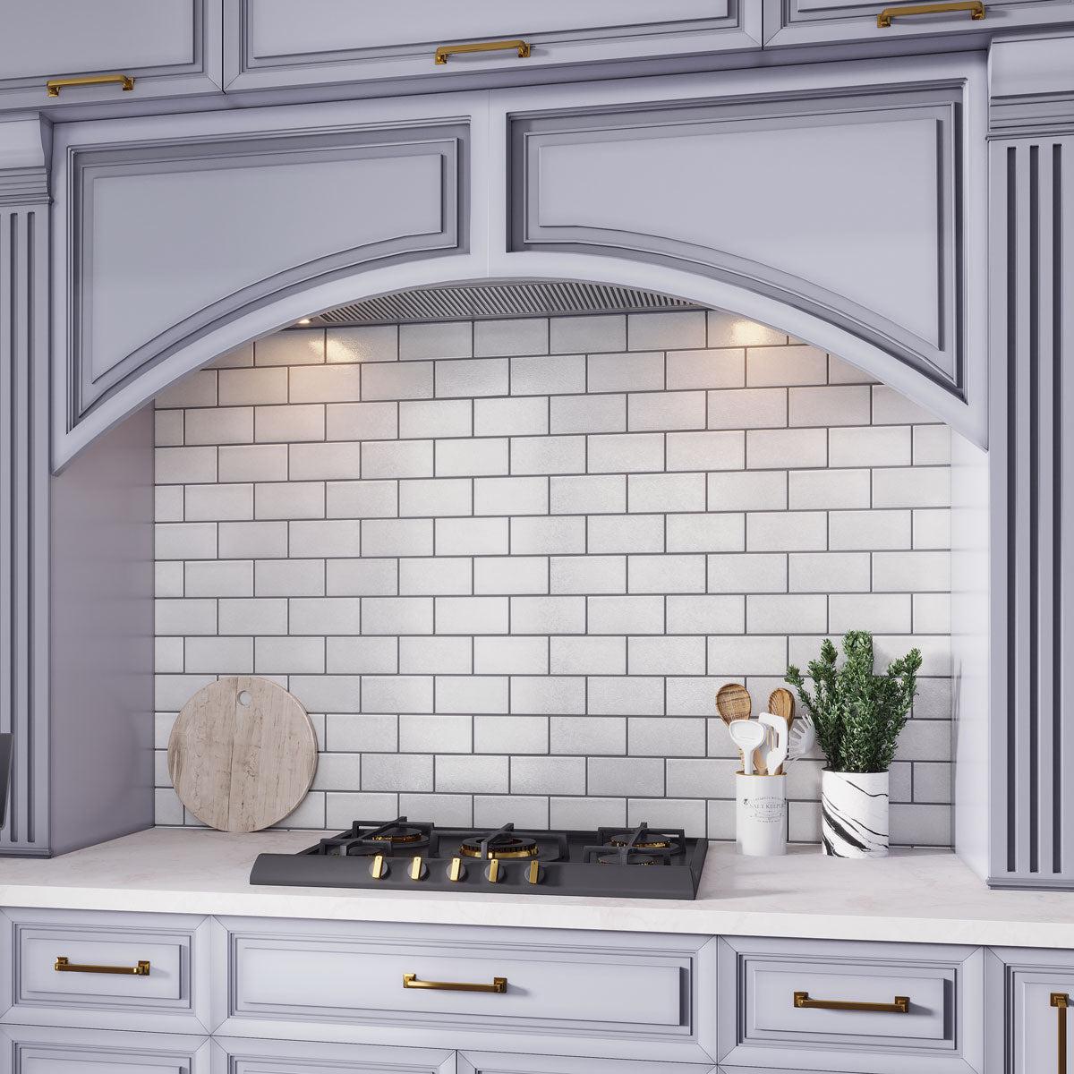Blue and white kitchen with Chateau white ceramic subway tile