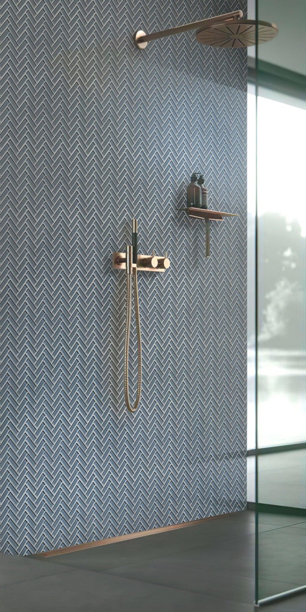 Cool Gray Herringbone Glass Tile wall in shower with panoramic window