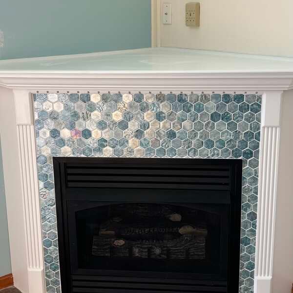 Fireplace surround with Coastal Mermaid Glass Tiles