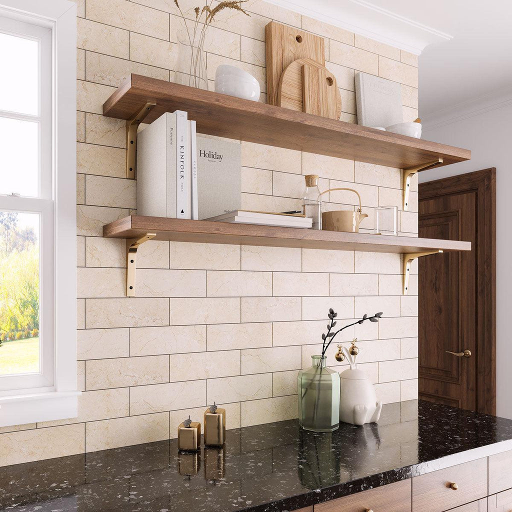 Warm neutral kitchen with Crema Marfil Subway tiles 