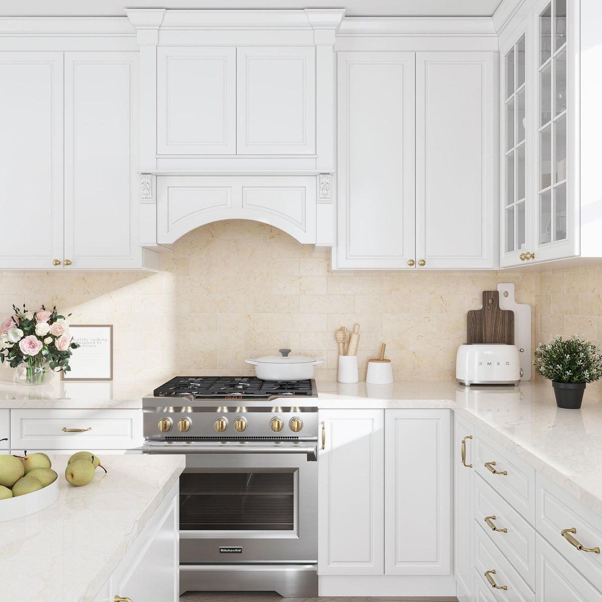 White and Silver Kitchen with Crema Marfil Marble Subway Tile Backsplash