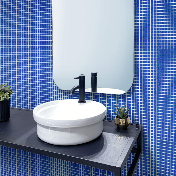 Mesmerizingly gorgeous bathroom with stunning Mixed Navy Blue Squares Glass Pool Tile