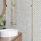 Bathroom shower wall with diamond shaped marble tile