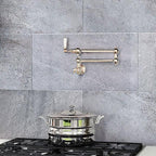 Kitchen Gas Stove on Background of Dover Gris Stone Look Gray Porcelain Tile Wall