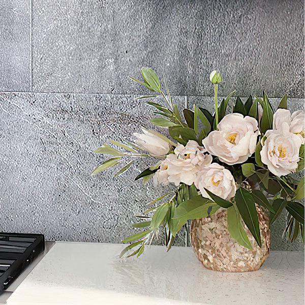 Vase with Flowers on the Background of Dover Gris Stone Look Gray Porcelain Tile
