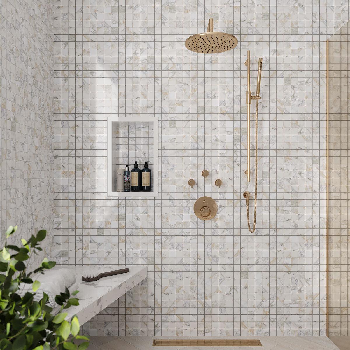 Calacatta Gold mosaic shower tile