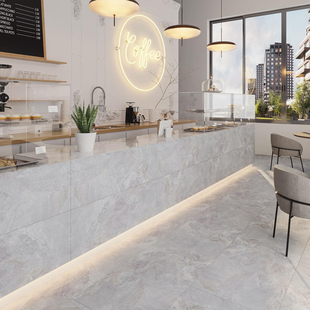 Emporio Grigio stone-look porcelain counter facing and floor in a coffee shop