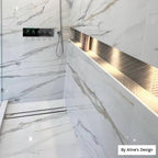 Standing shower with marble porcelain tile