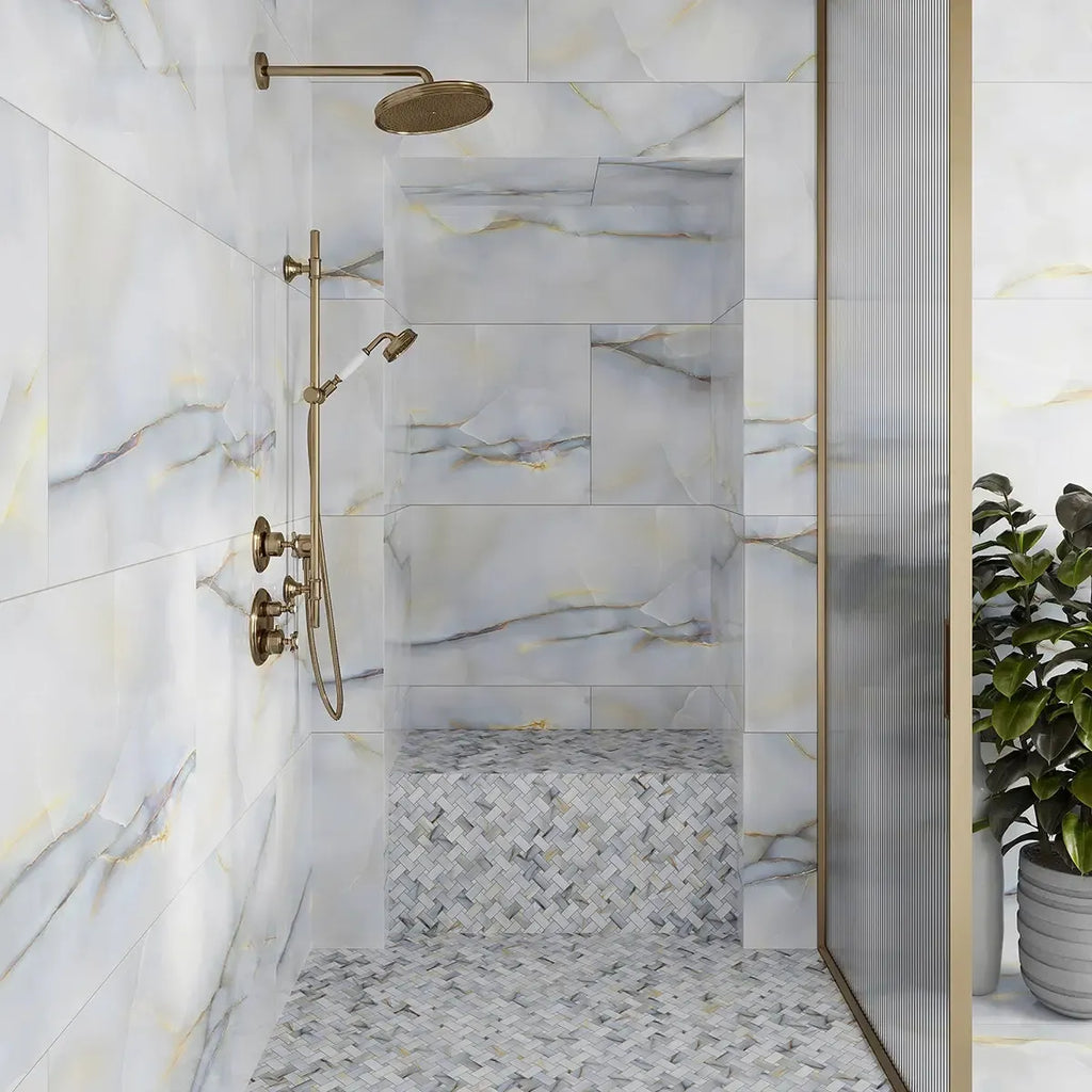 Blue stone look porcelain tile shower with matching mosaic floor tile