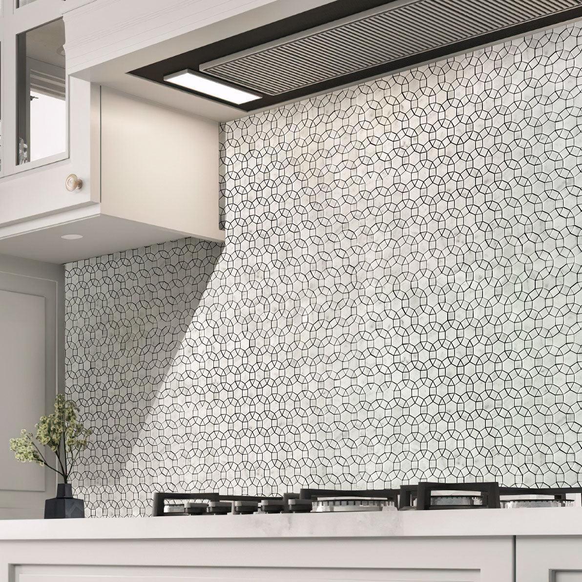 Interlocking circle Carrara marble kitchen wall tile behind the stove