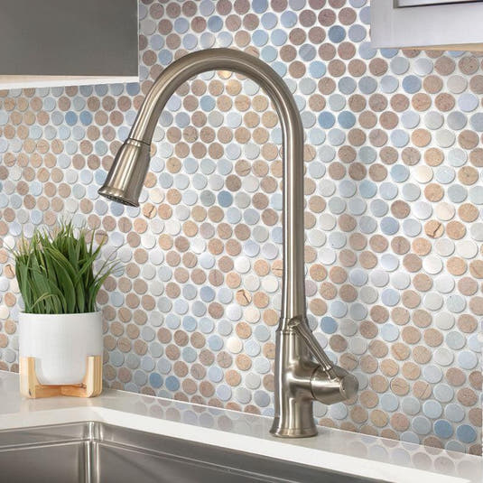 Marble penny tile kitchen backsplash