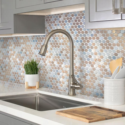 Kitchen with earth tones penny tile backsplash