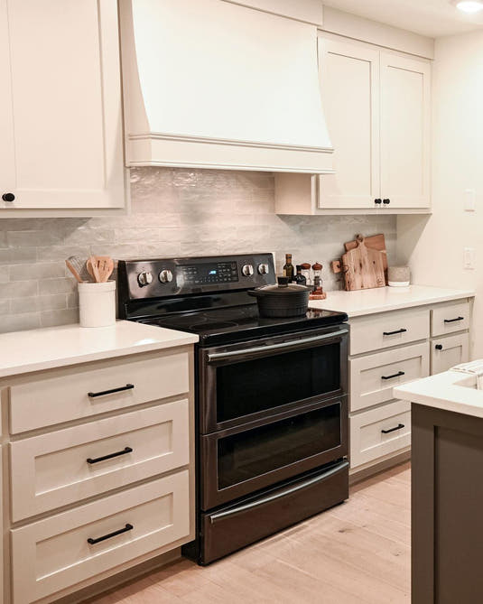 Fixer to Fabulous White and Blue Kitchen with Tile Club Mallorca Blue Ceramic Subway Tile