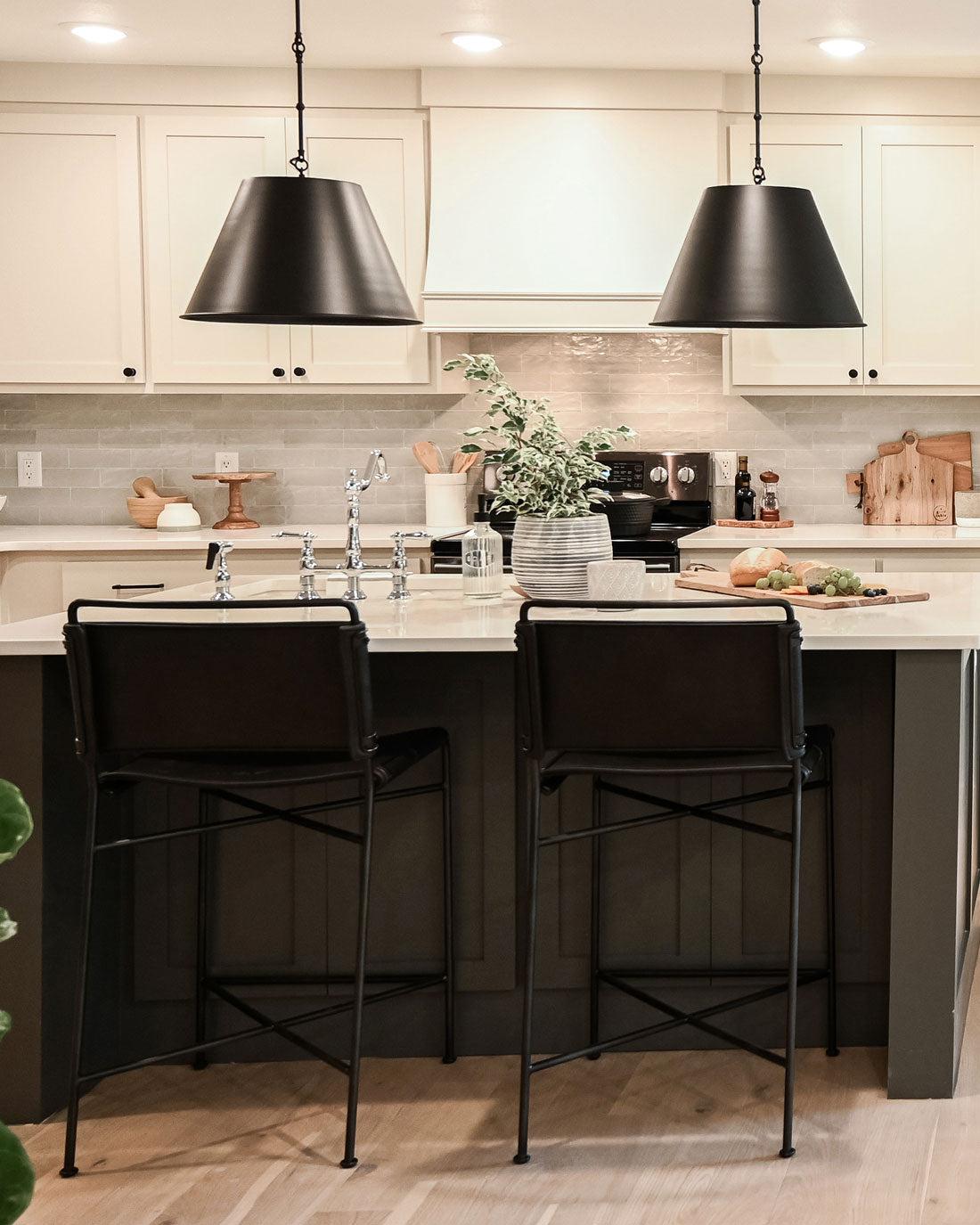 Black, White and Blue Modern Farmhouse Kitchen on HGTV Fixer to Fabulous with Tile Club Mallorca Blue Ceramic TIle