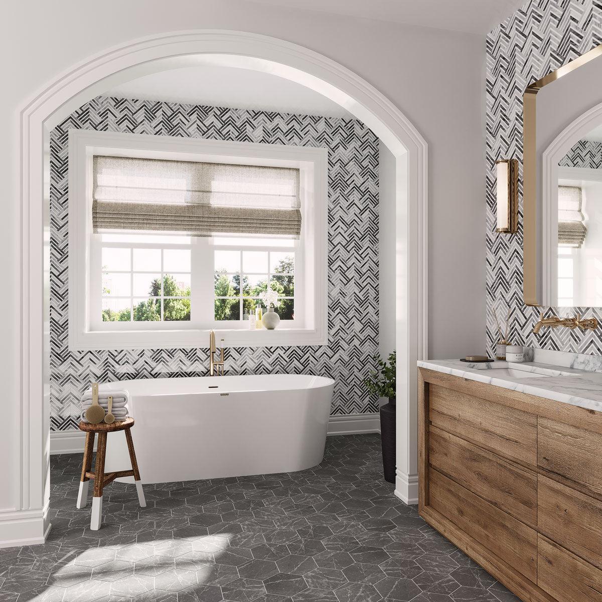 Gray and white bathroom with geometric marble tile walls