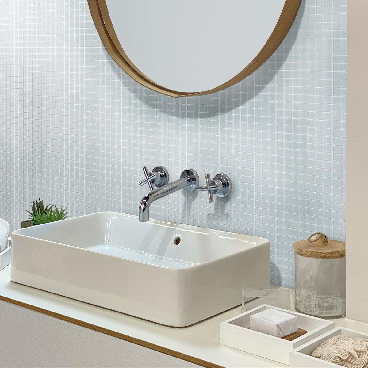 Elegant and serene bathroom featuring Glacier Aura Gray Frosted Glass Tile