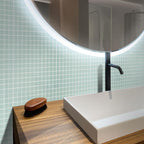 The Glacier Breeze Frosted Glass Tile creates a refreshing and serene ambiance