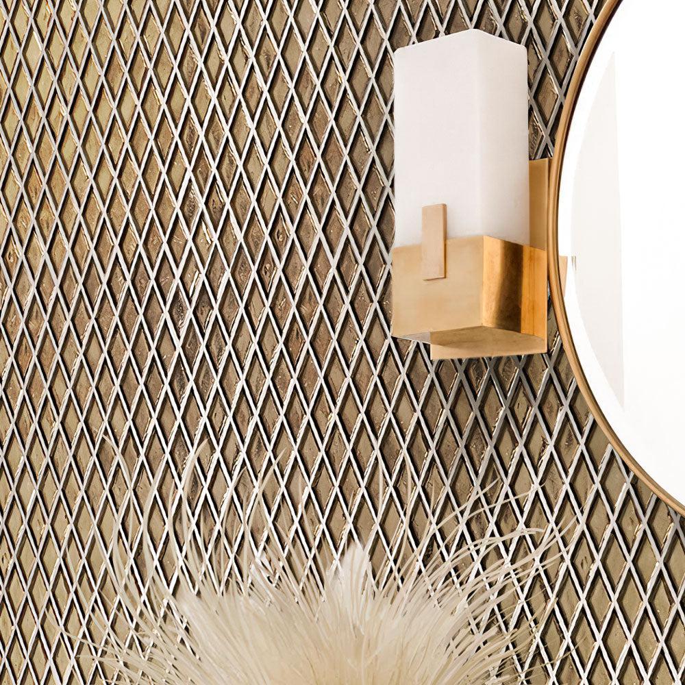 Modern lamp on the background of a Gold Diamond Glass Mosaic Tile wall