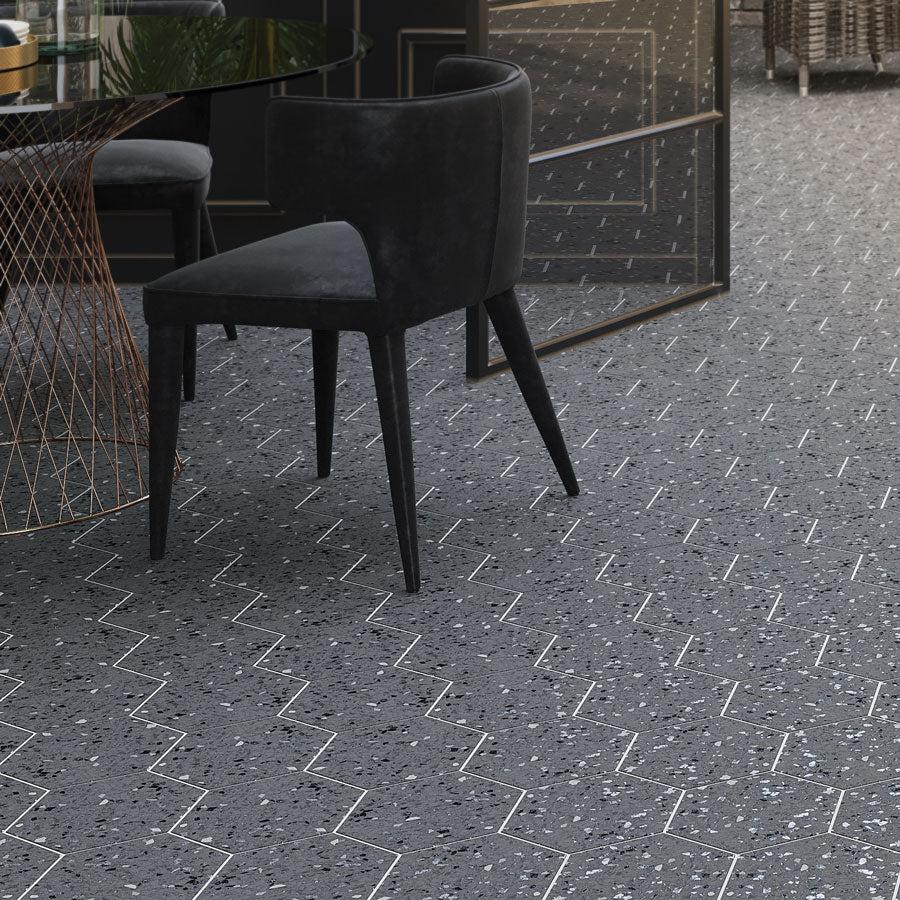 Glass Table & Black Chair on Graphite Gray Terrazzo Hex Porcelain Tile Floor