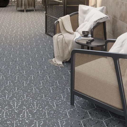 Wicker Chairs on Graphite Gray Terrazzo Hex Porcelain Tile Floor