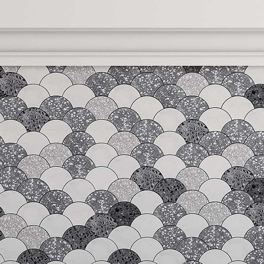 Gray and white fan tile with terrazzo speckles