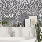 Geometric glass subway tile bathroom feature wall