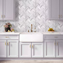 Light gray kitchen with  Ice White Chevron Glass Mosaic Tile backsplash 