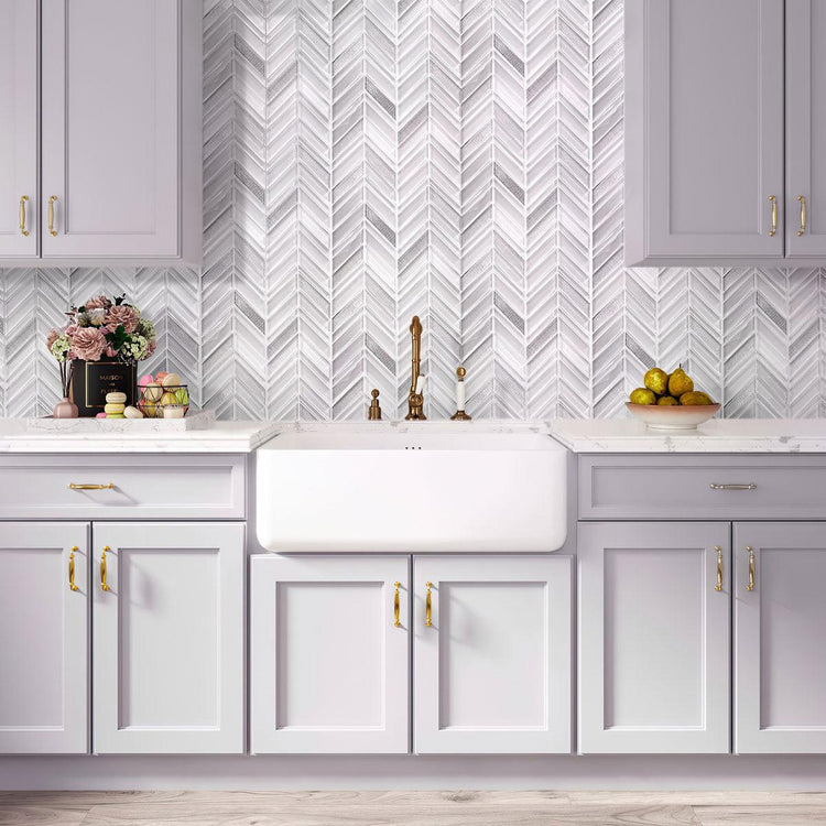 Light gray kitchen with  Ice White Chevron Glass Mosaic Tile backsplash 